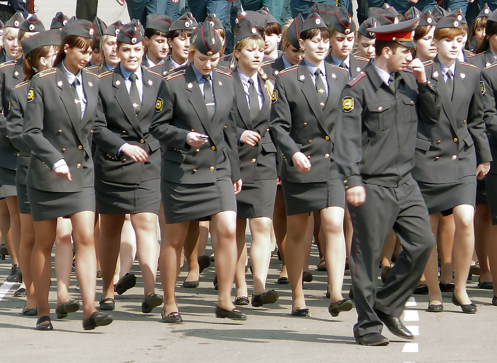 Women in pantyhose and uniform
