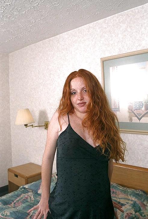 Pregnant redhead posing her lovely body #10668508