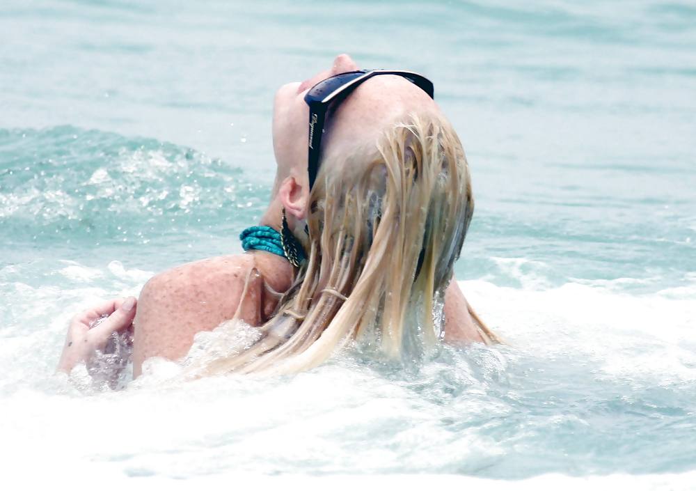 Lindsay Lohan In Bikini on Miami Beach BOOB Slip #3913153