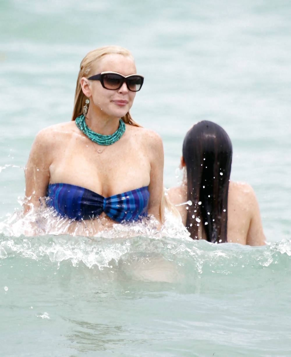 Lindsay Lohan In Bikini on Miami Beach BOOB Slip #3913182