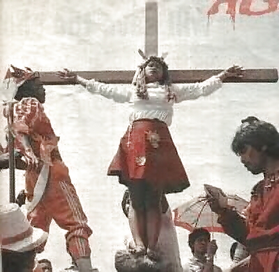 Crucified girl and teen #8058202