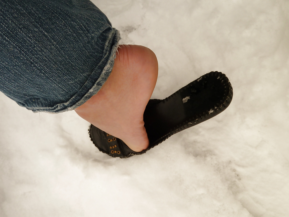 Feet in snow #8298993