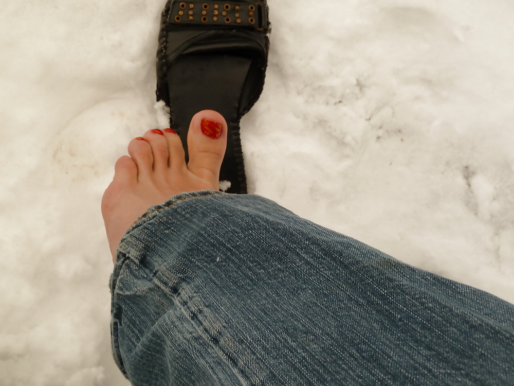 Feet in snow #8299014