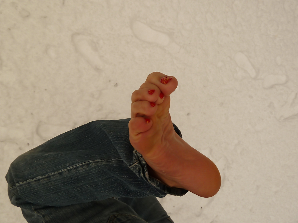Feet in snow #8299021