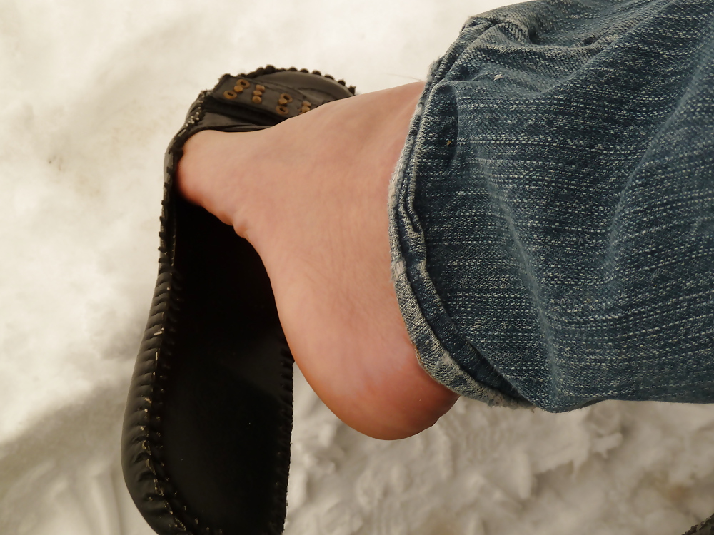 Feet in snow #8299022