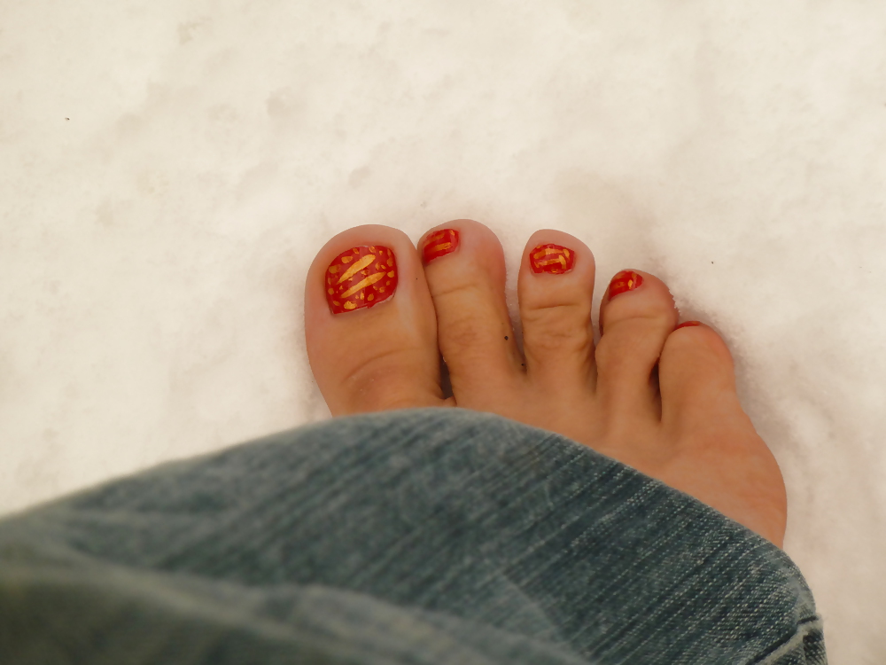 Feet in snow #8299026
