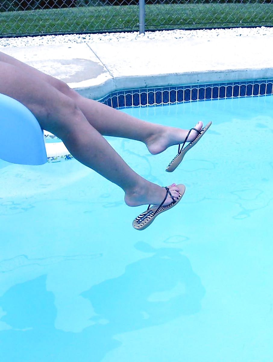 My wife's feet by the pool #473740