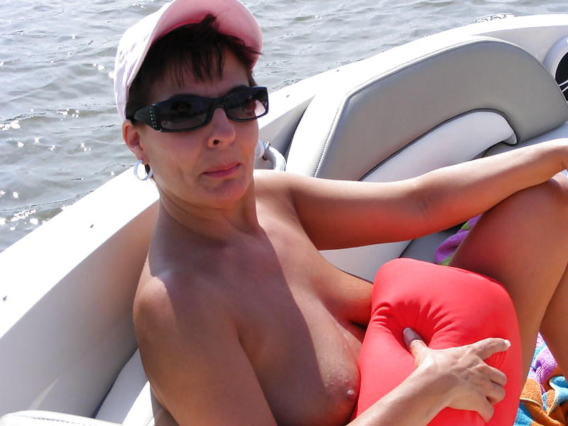 Older women naked at the boat. #3487551