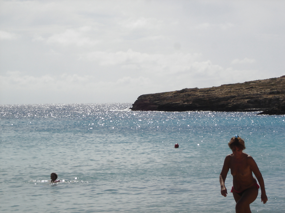 Mature woman in beach  #9590051