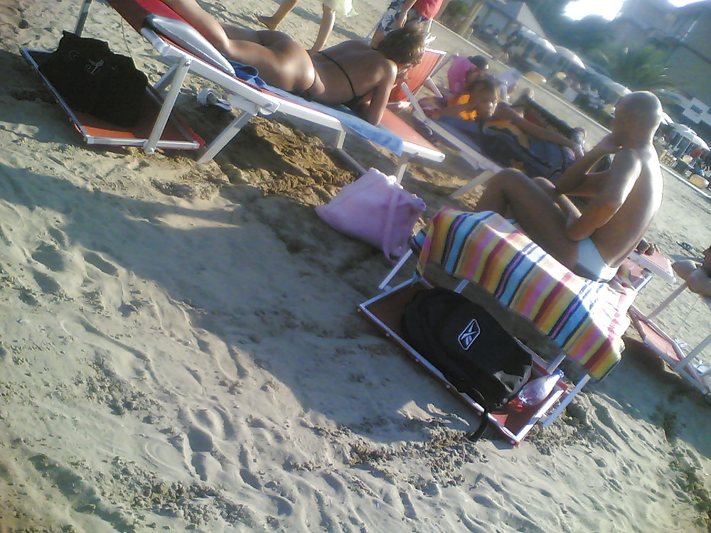 Sexy tan ass on italian beach #7393992