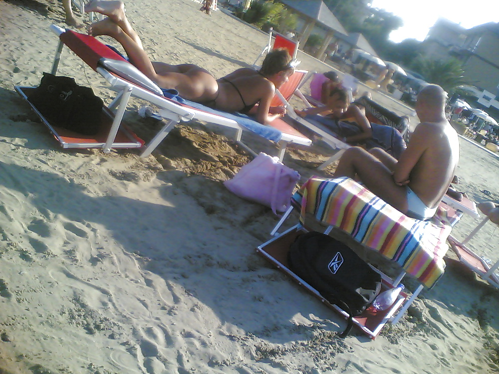 Sexy tan ass on italian beach #7394018