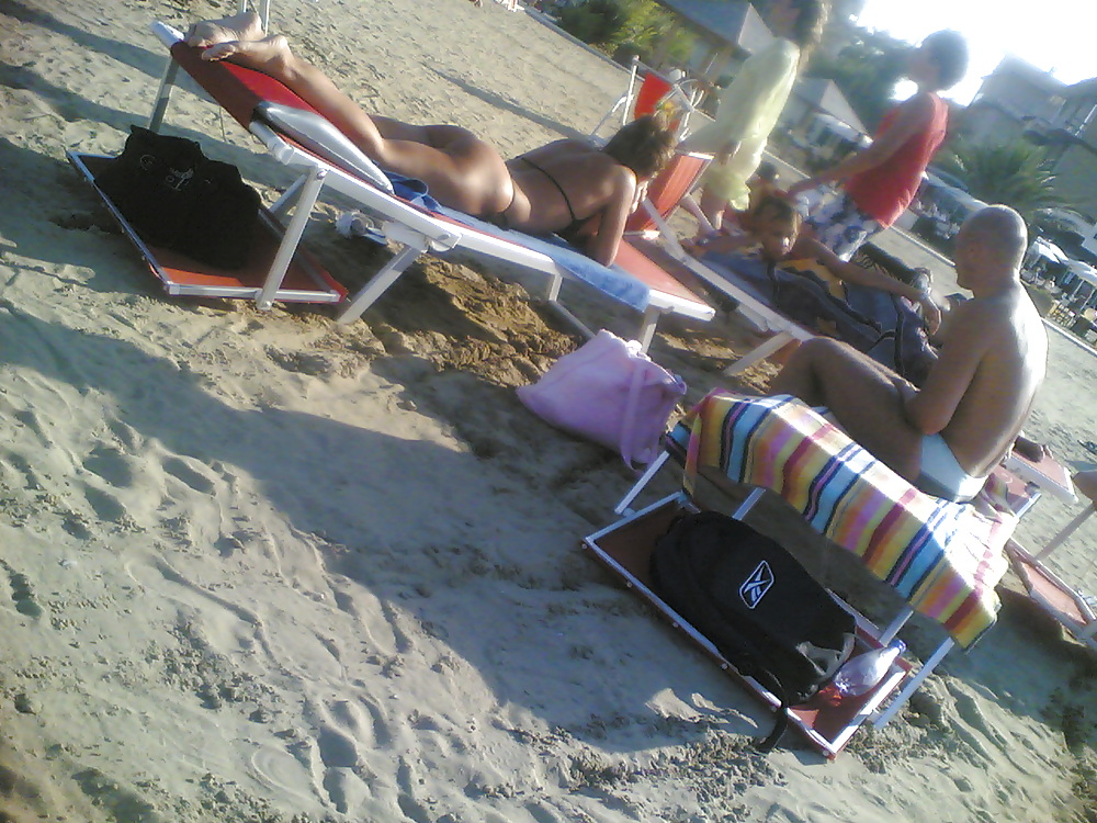 Sexy tan ass on italian beach #7394100