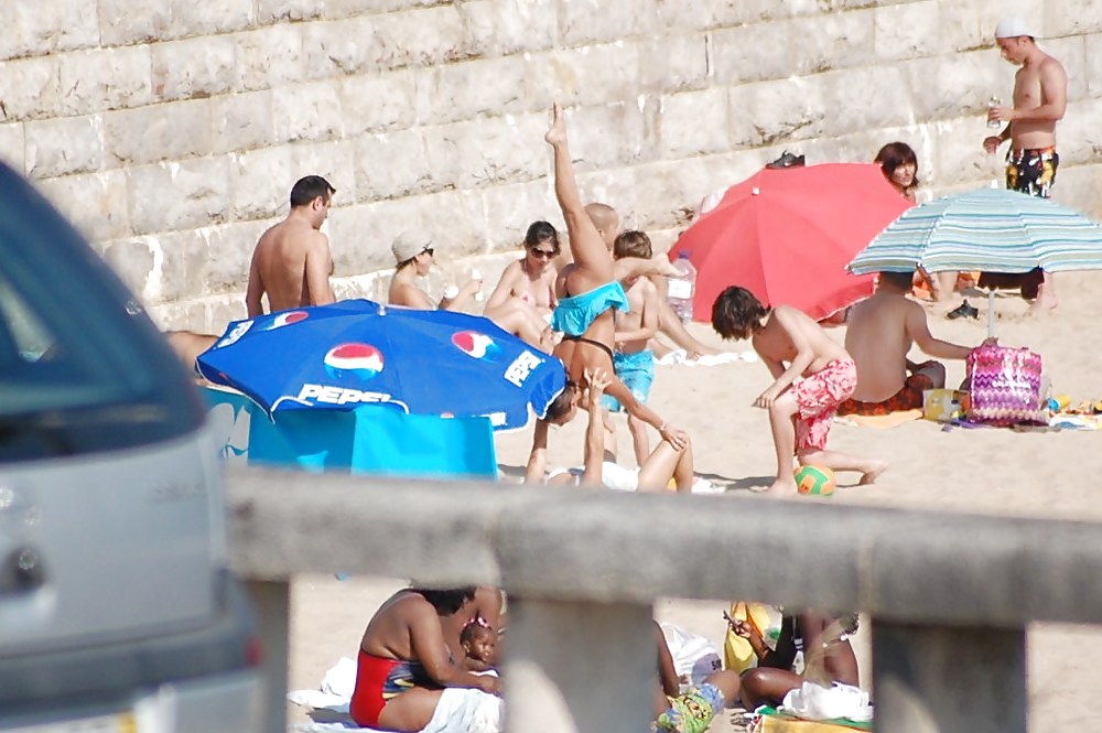 Giovane caldo sulla spiaggia
 #1671596