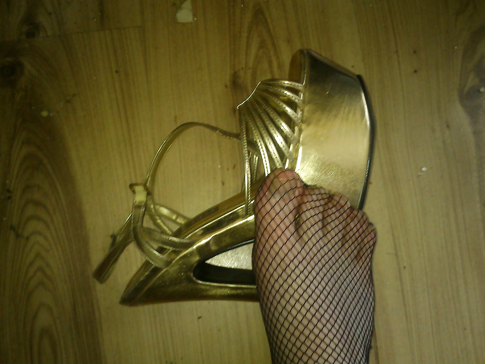 Heels and fishnet stockings #10134253