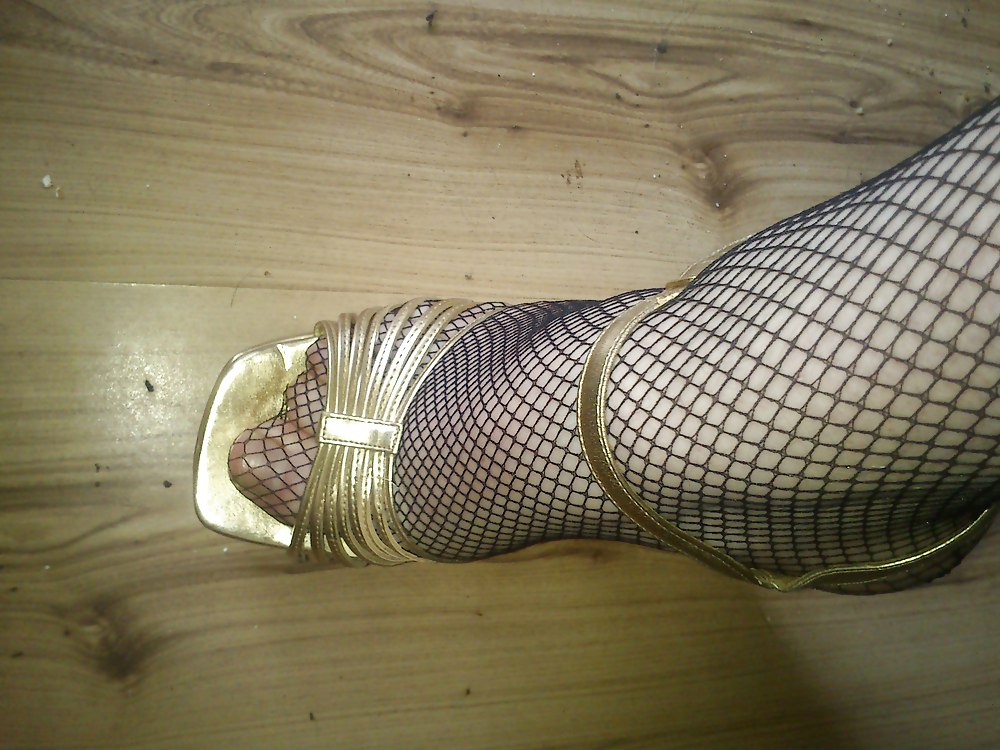 Heels and fishnet stockings #10134260