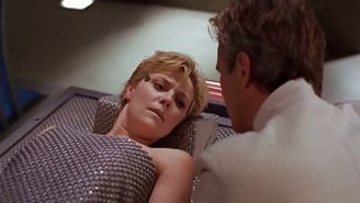 Amanda tapping breasts
