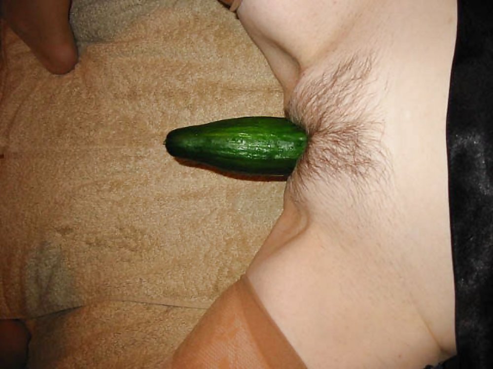 Mature Enjoying A Cucumber #16082116
