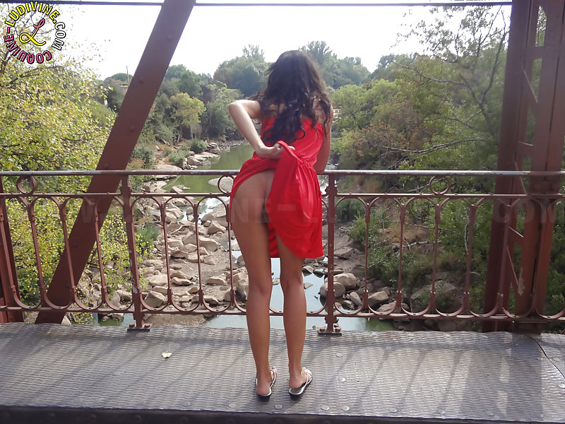 Ludivine slut showing off on a rusty bridge #16043556