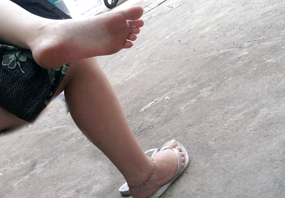 Candid feet in flip flops #10211692