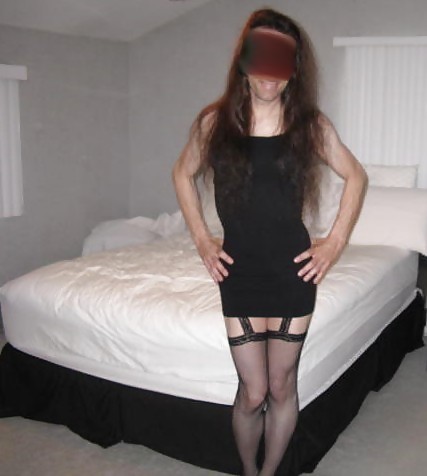 Short black dress with fishnet suspender stockings #2625441