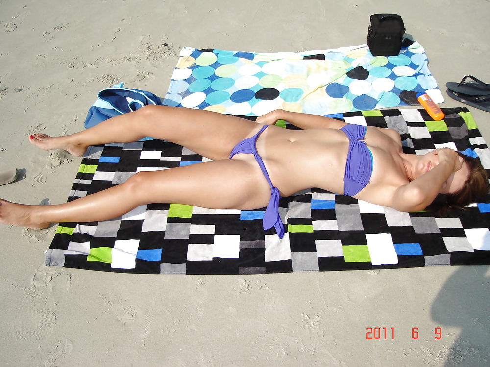 Trina tanning on Myrtle Beach, See vids of this suit also!