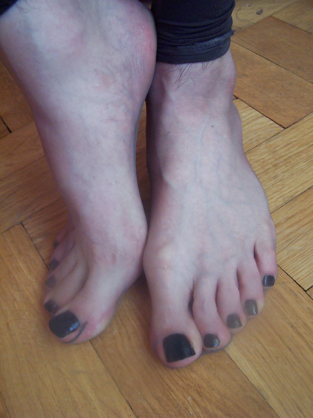 Feet In sheer grey stockings #17315537