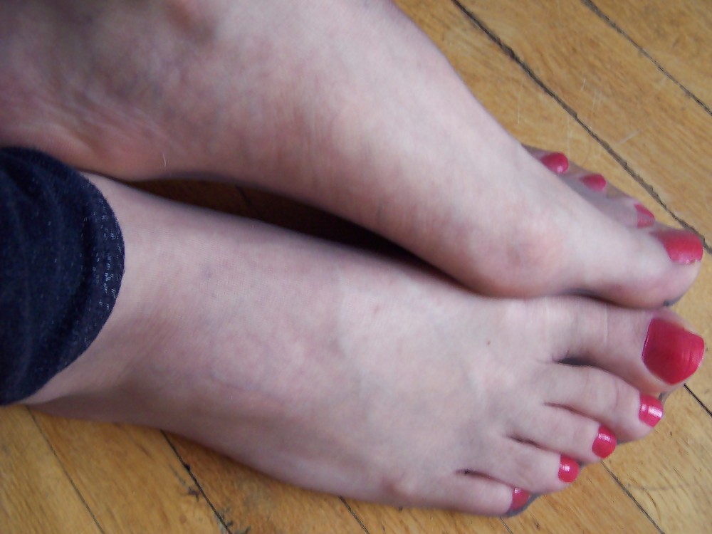 Feet In sheer grey stockings #17315591