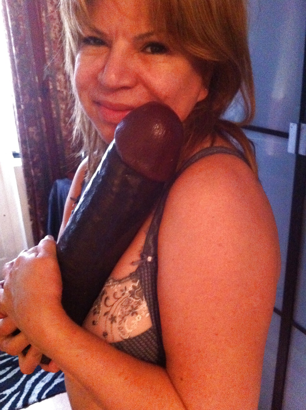 Puttana con dildo nero
 #12463609