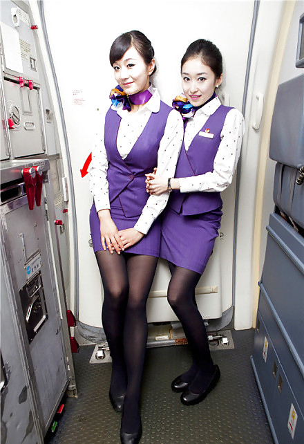 Echte Asiatische Stewardesses Luft Flugbegleiter #13009616