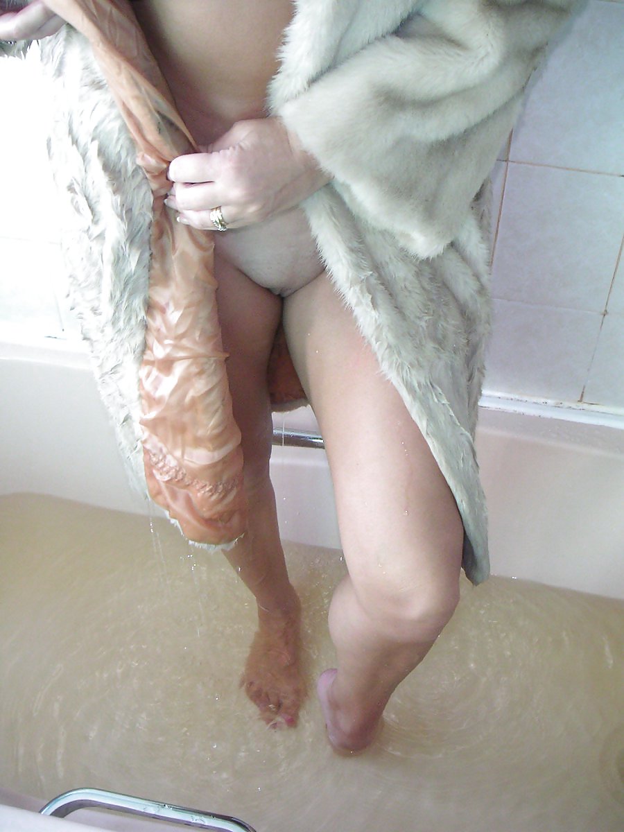 Fur coat in bathtub #3603639