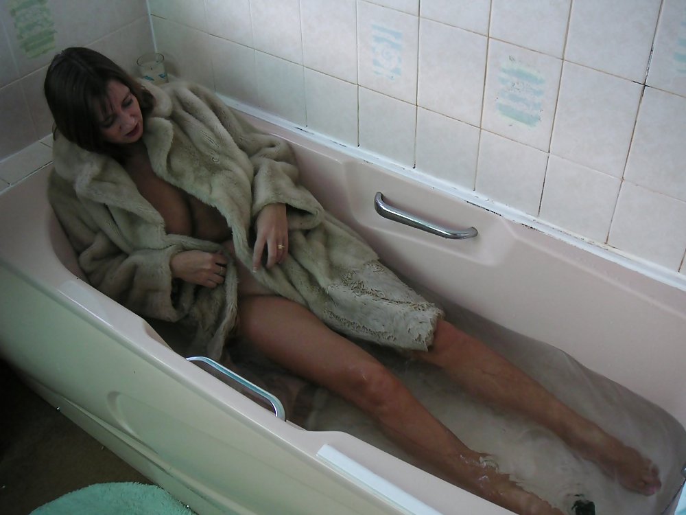 Fur coat in bathtub #3603942