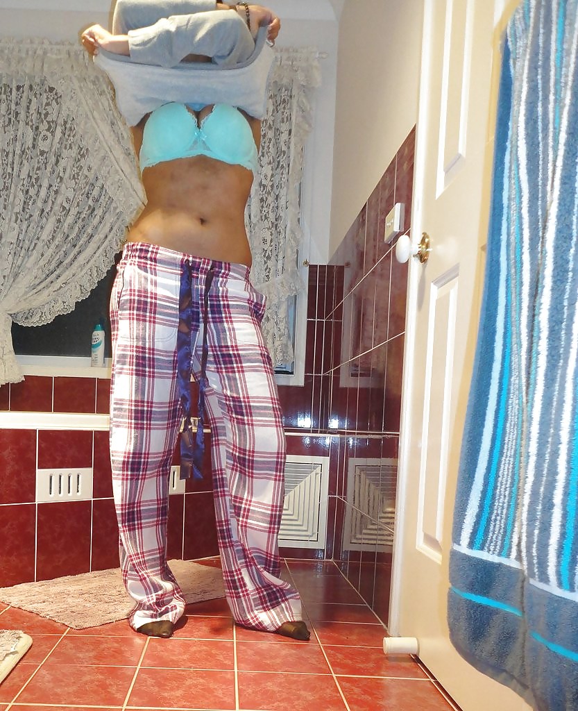 A Pakistani chick stripteasing in bathroom - selfshot #13381828