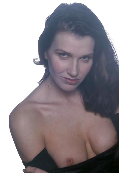 Saucy brunette posing in a studio #18466158