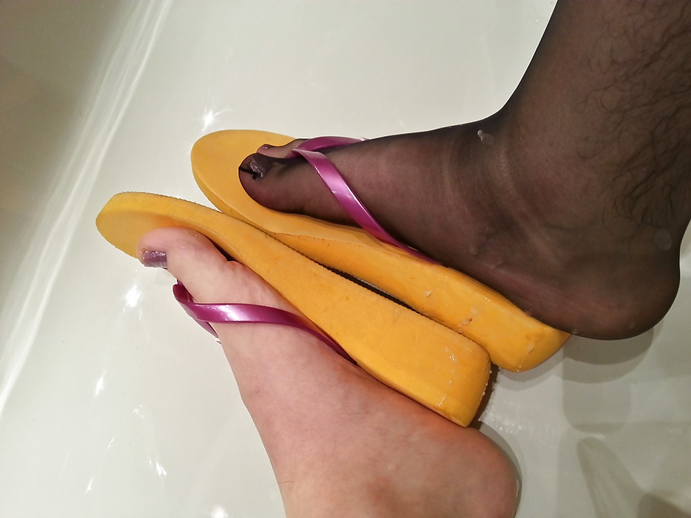 My feet with nylons, polish and my mother's flip flops #21156650