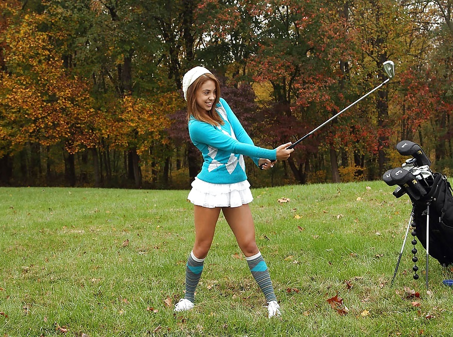 Cute Teen On Public Golf Course.