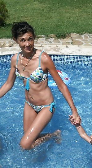 Mommy in bikini almost flashing her little tits #9802984