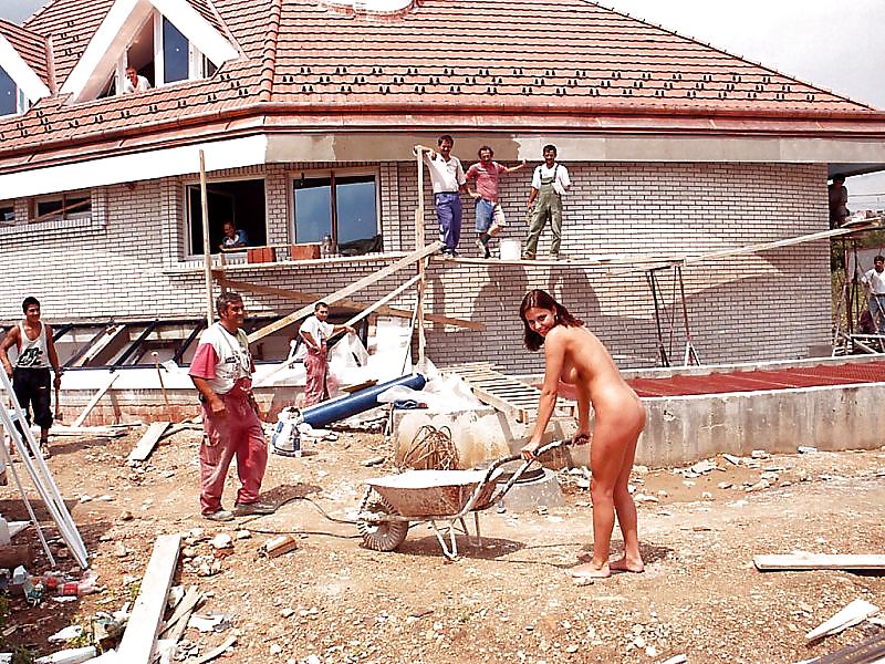 Naked brunette visiting a building site #15020086