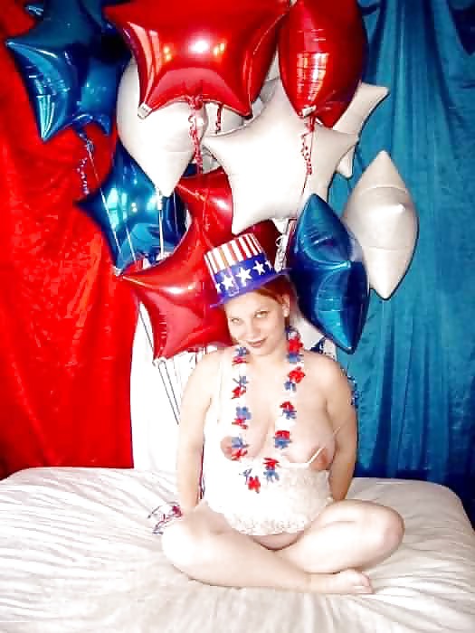 Pregnant redhead in white red and blue