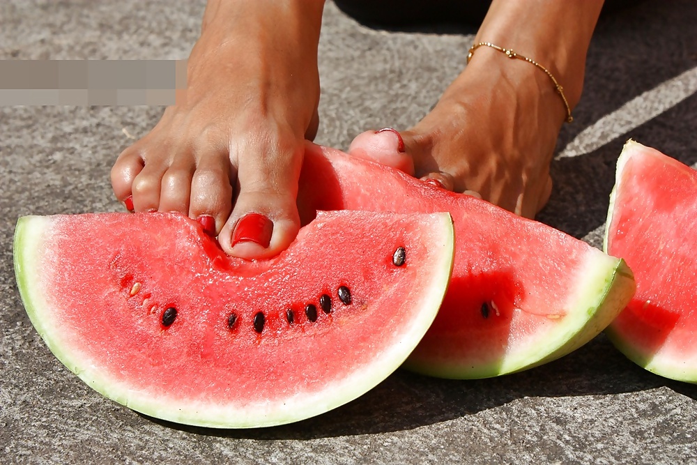 Mature feet and watermelon #19640783