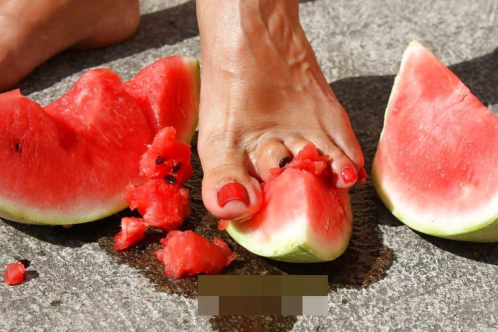 Mature feet and watermelon #19640842