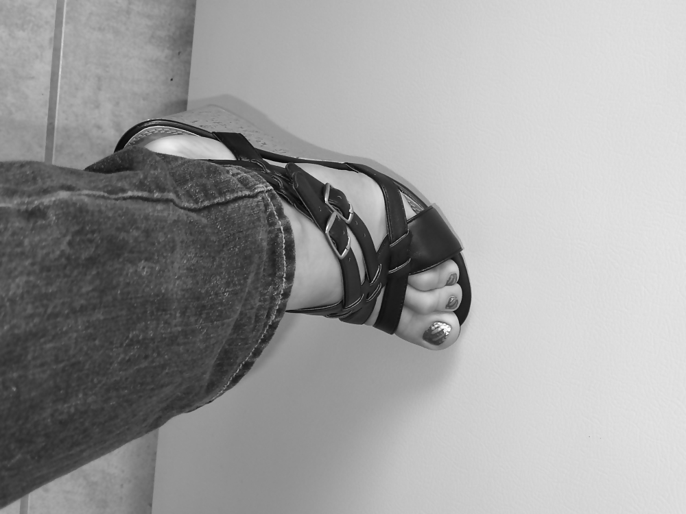 Girls feet in wedges heels #9375309