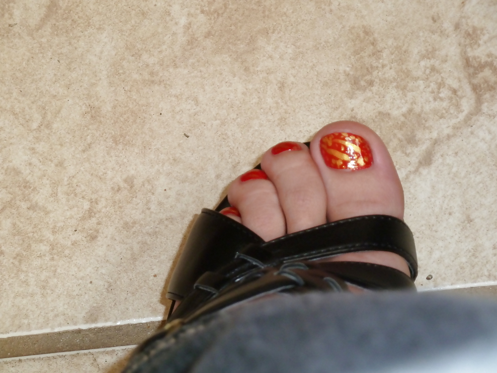 Girls feet in wedges heels #9375361