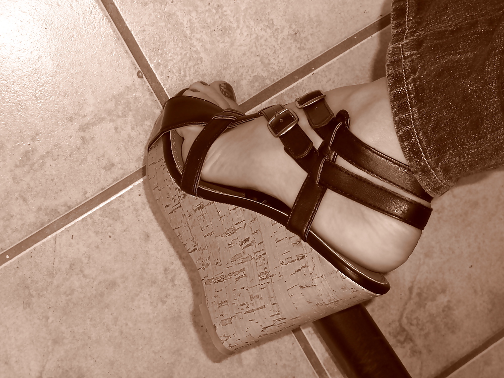Girls feet in wedges heels #9375388