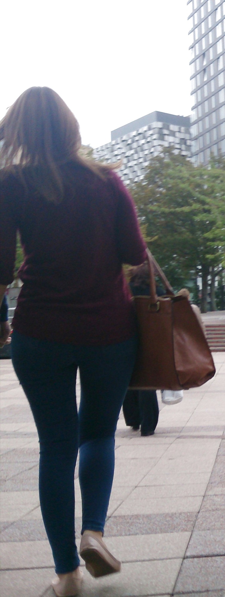 Street candid - Black jeans light blue top