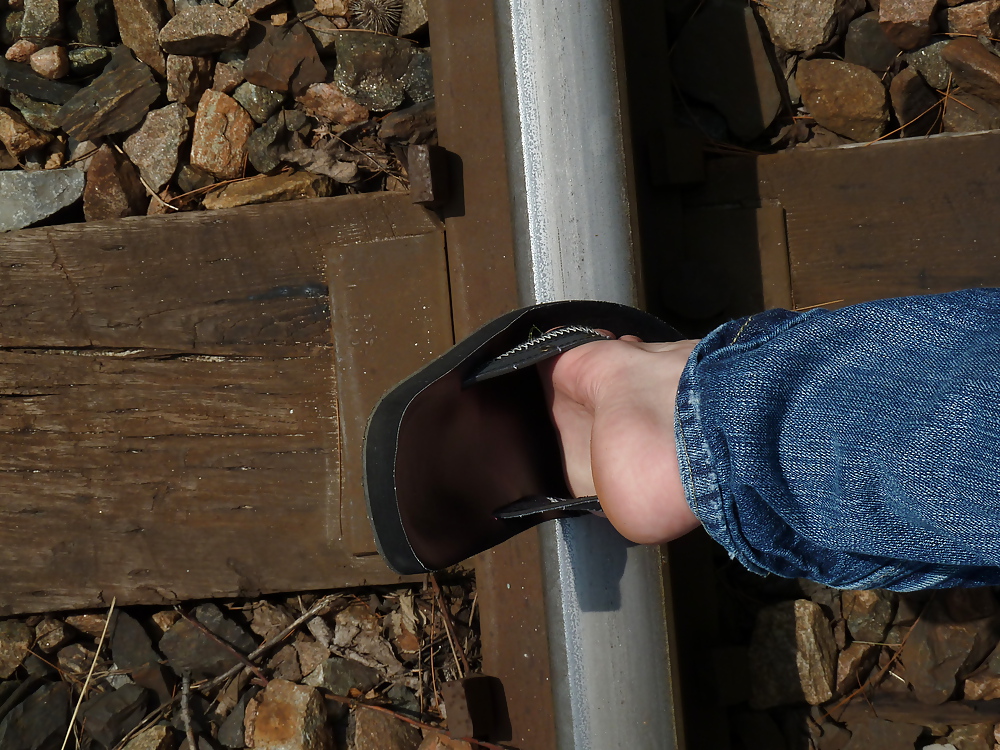 Feet on rails train #21082339