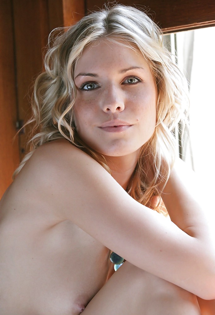 Freckled blonde Iveta posing #19044660