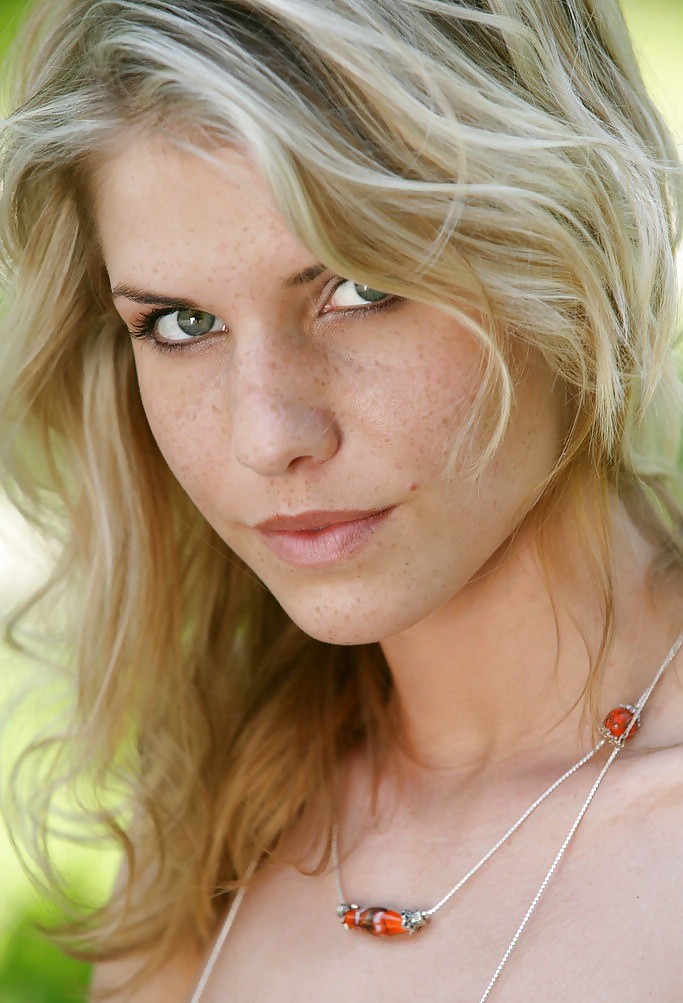 Freckled blonde Iveta posing #19045175