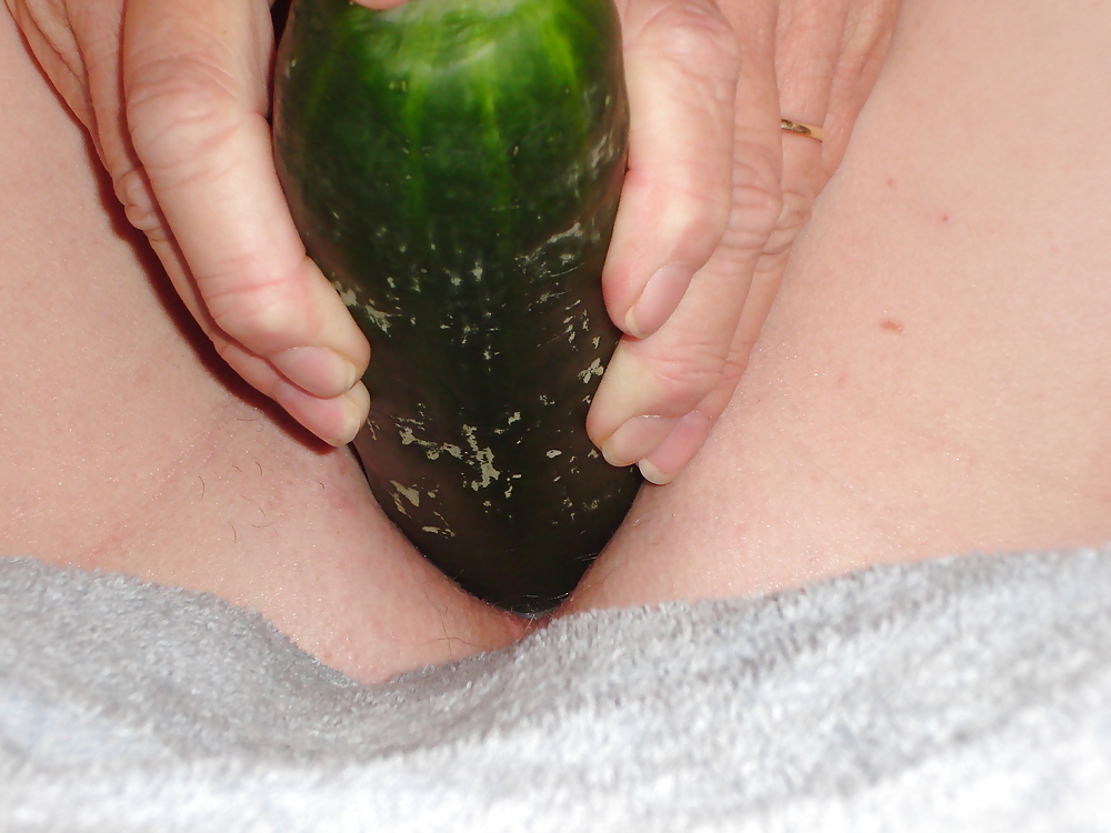 Wife with a cucumber #2588524
