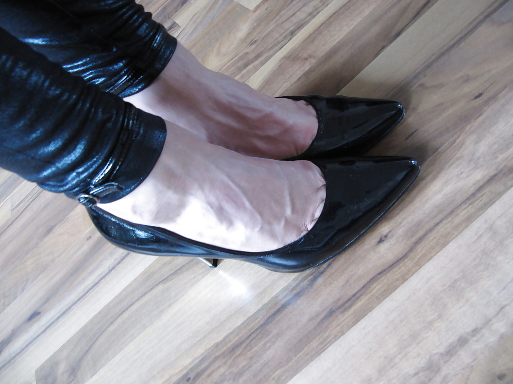 Foot torture with peas in high heels, leggings and corset #21593806