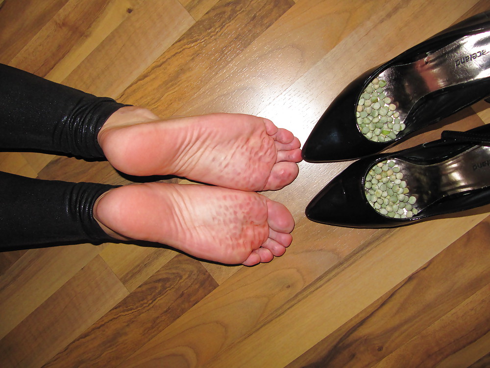 Foot torture with peas in high heels, leggings and corset #21593811